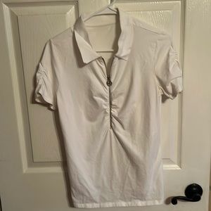 Michael Kors zipper front short sleeve shirt. With gathered sleeves and front